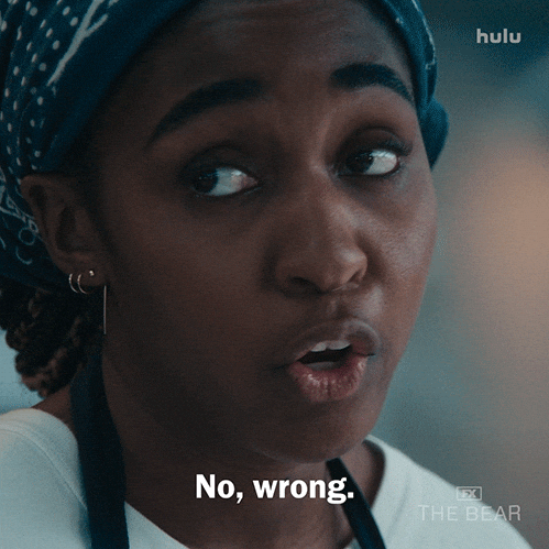 A GIF from the TV series "The Bear" where Sydney Adamu says "no, wrong".