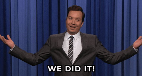 A GIF showing Jimmy Fallon happily saying 'We did it!' to an off-screen crowd.